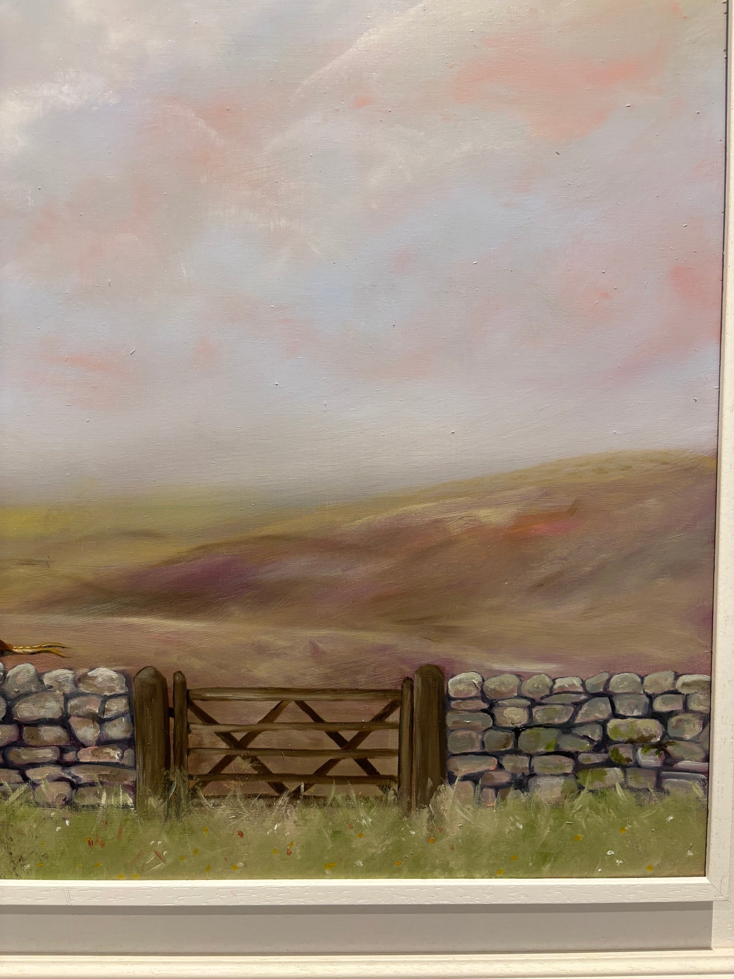 Painting of a landscape with a wooden gate and stone wall.