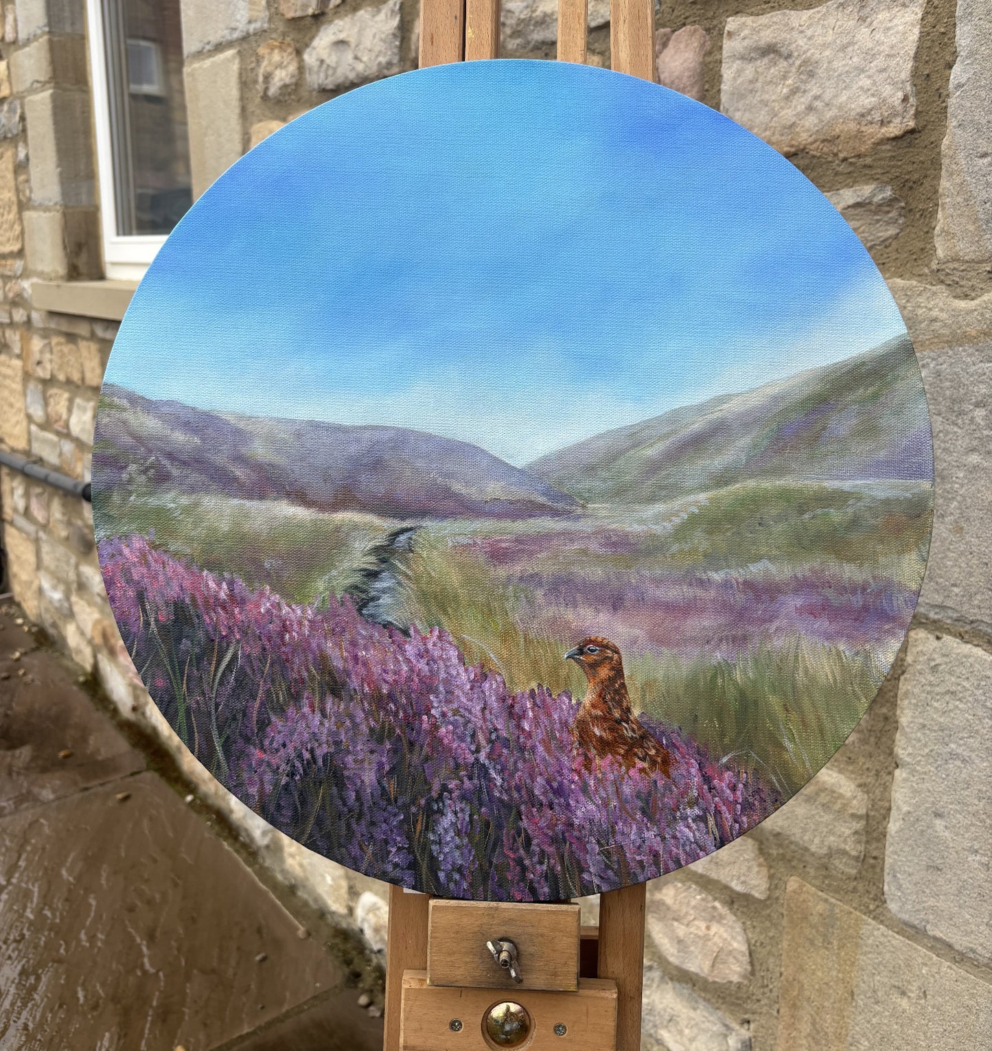 an original oil painting of a countryside scene depicting moorlands, heather and a red grouse in a landscape 