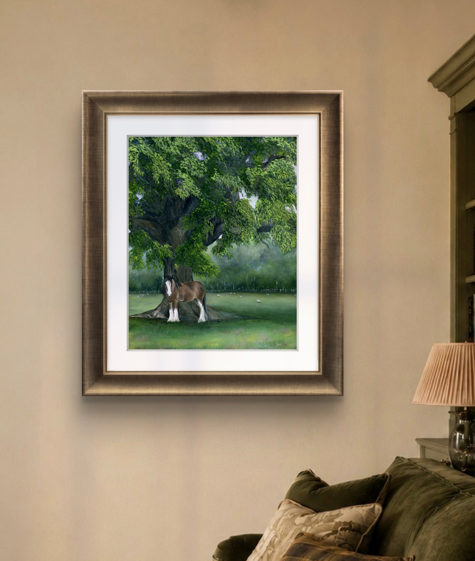 Framed artwork of a horse under a tree in a living room setting.