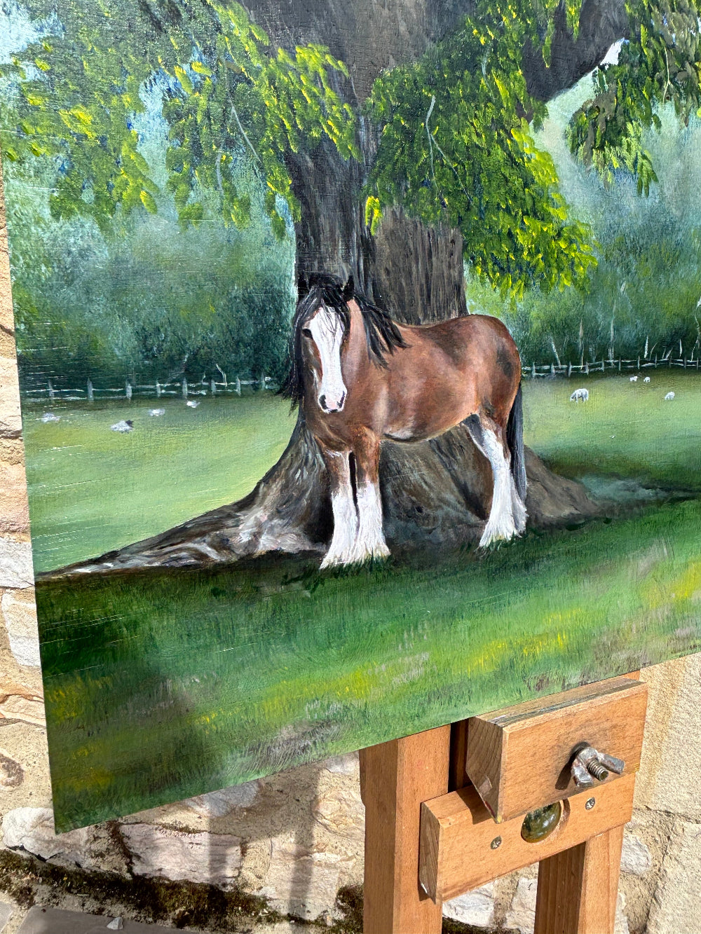 Horse painting on a textured surface with a wooden frame.